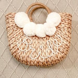 Bride Straw Purse with White Pom Poms.
